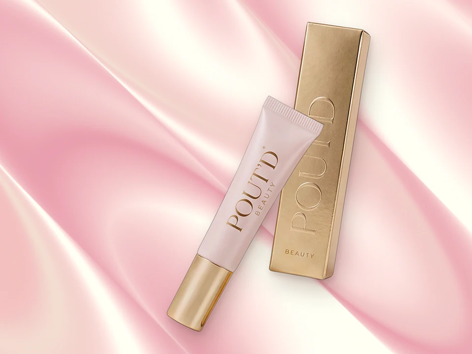 POUT'D Lip Plumper on silk: a date-night glossy, fuller-looking pout in one $25 tube