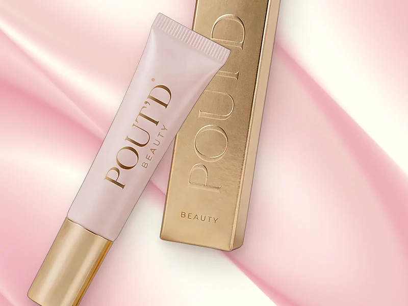 Pout'd Lip Plumper on deep pink silk: a non-sticky, long-wear glossy lip plumper, $25